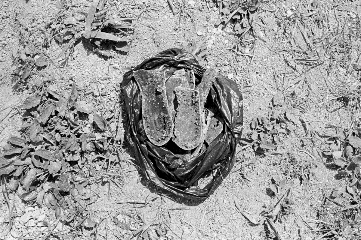 Shoes from a mass grave, Crimea, where about 13,000 people were murdered in December 1941.